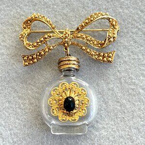 Perfume Bottle Brooch Large Bow Gold Tone Glass Stamped 27 Black Cabochon READ